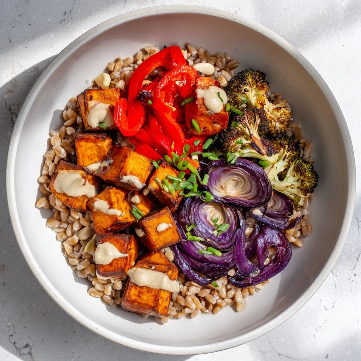 Close-up of a colorful Hearty Roasted Vegetable and Farro Grain Bowl, ready to serve with fresh parsley.