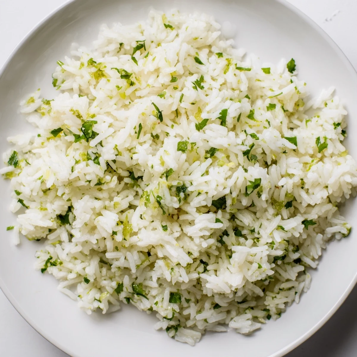 Fluffy cilantro lime rice, infused with citrus and fresh herbs, ready to serve warmly.