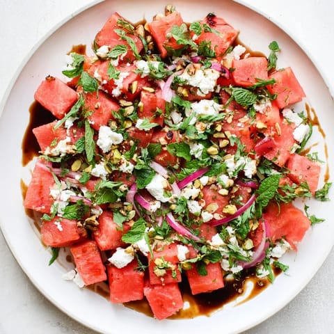 This bright Fresh Watermelon and Feta Salad bursts with flavor, featuring fresh mint and tangy balsamic dressing.
