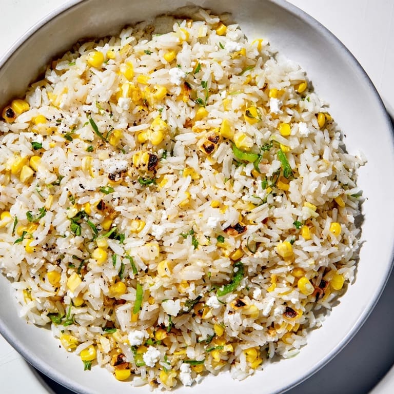 This picture showcases vibrant Mexican Street Corn Rice – a perfect side, bursting with fresh corn flavor.