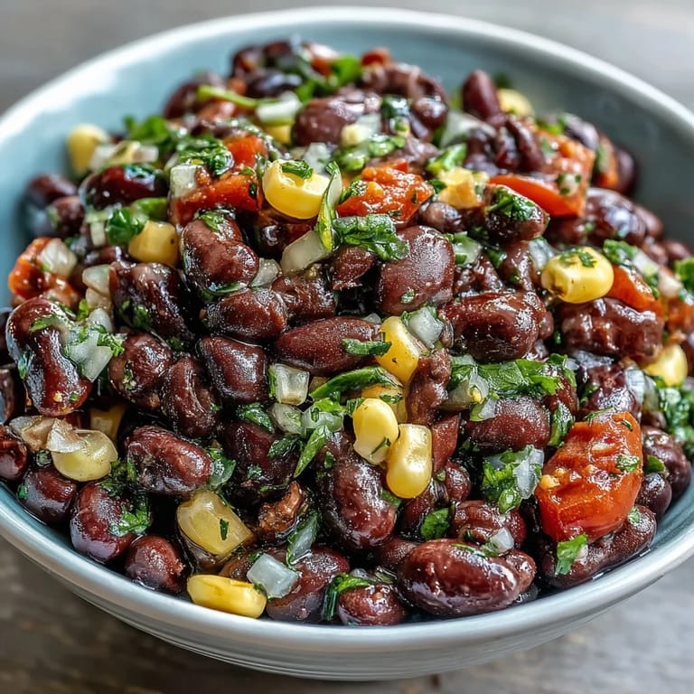 Vibrant 3-Ingredient Cowboy Caviar Dip with hearty black beans, golden corn, and tangy pico de gallo, ready in minutes.